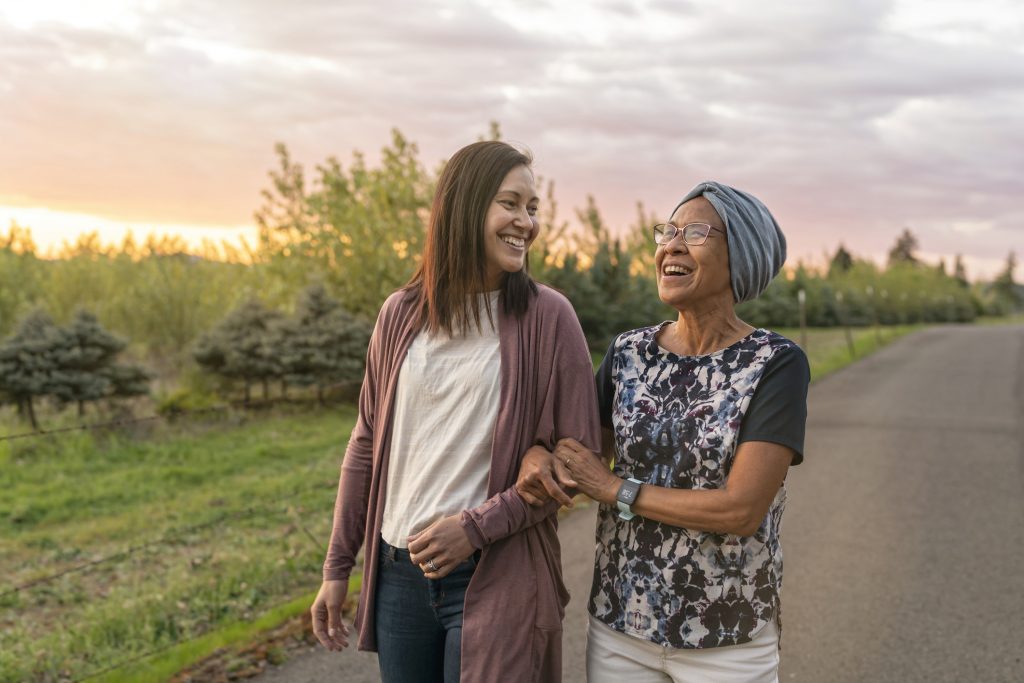 Sunny Vista Colorado Springs Life Plan Community - Granddaughter and grandmother walking together